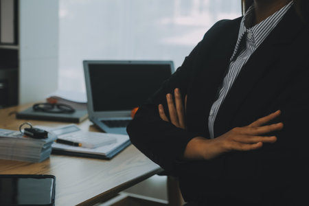 Salesman send key to customer after good deal agreement, successful car loan contract buying or selling new vehicle.の写真素材