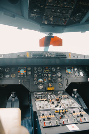 inside a big jet flying plane cockpit,flying above cloudsの写真素材