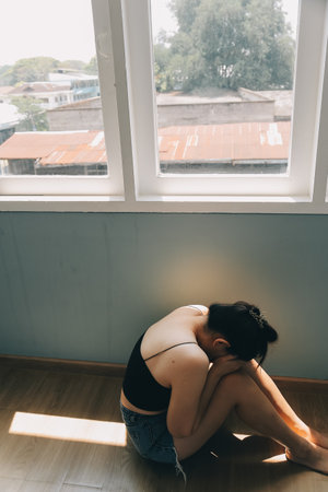 panic attacks alone young girl sad fear stressful depressed emotional.crying use hand cover face begging help.stop abusing domestic violence in women,person with health anxiety,people bad feeling downの写真素材