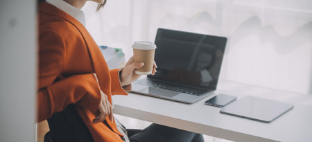 Audit concept,Administrator business man financial inspector and secretary making report calculating balance. Internal Revenue Service checking document.の写真素材