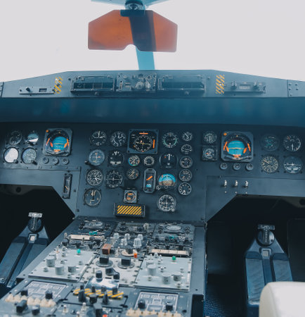inside a big jet flying plane cockpit,flying above cloudsの写真素材