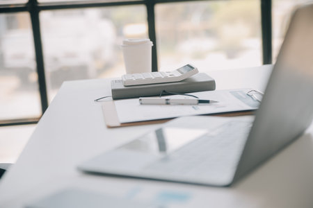 Business Documents, Auditor businesswoman checking searching document legal prepare paperwork or report for analysis TAX time,accountant Documents data contract partner deal in workplace officeの写真素材