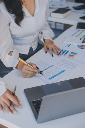 Business team collaboration discussing working analyzing with financial data and marketing growth report graph in team, presentation and brainstorming to strategy planning making profit of company.の写真素材