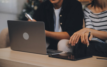 Asian business people discussing team of young asian entrepreneurs discussing business, Asia business team meeting discussion talking.の写真素材
