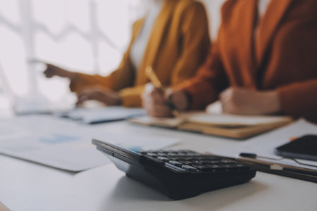 Team of business people working together in the meeting room office, teamwork background charts and graphs banner, double exposure successful teamwork,business planning concept.の写真素材