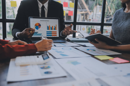 Finance manager meeting discussing company growth project success financial statistics, professional investor working start up project for strategy plan with document, laptop and digital tablet.の写真素材