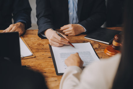 Good service cooperation, Consultation of Businesswoman and Male lawyer or judge counselor having team meeting with client, Law and Legal services concept.の写真素材