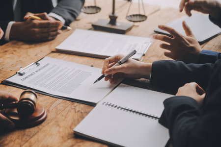 Good service cooperation, Consultation of Businesswoman and Male lawyer or judge counselor having team meeting with client, Law and Legal services concept.の写真素材