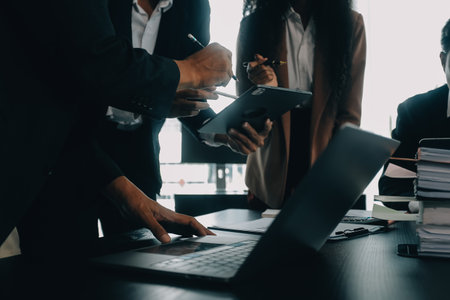 Business team collaboration discussing working analyzing with financial data and marketing growth report graph in team, presentation and brainstorming to strategy planning making profit of company.の写真素材
