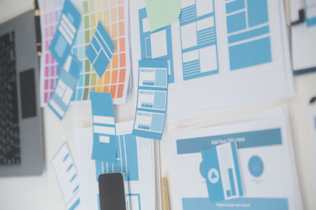 Close up ux developer and ui designer use augmented reality brainstorming about mobile app interface...