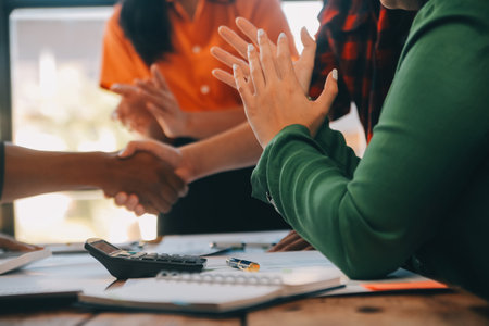 Meeting and greeting concept, Two confident Business handshake and business people after discussing good deal of Trading contract and new projects for both companies, success, partnership, co worker.の写真素材