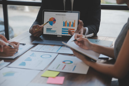 Finance manager meeting discussing company growth project success financial statistics, professional investor working start up project for strategy plan with document, laptop and digital tablet.の写真素材