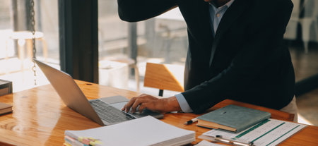 Group of Young Asian business team creative businesspeople coworker in office Happy to be successful partnership teamwork celebrating achievement and success concept.の写真素材