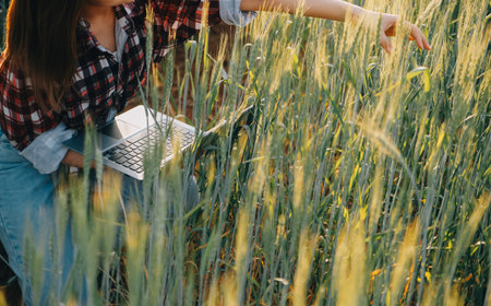 Smart farm. Farmer with tablet in the field. Agriculture, gardening or ecology concept. Harvesting....