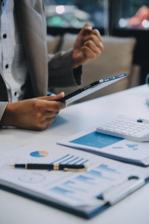 Office, tablet and business man happy for positive financial savings, finance budget report or administration feedback. Growth analytics, data analysis review and person smile for research statisticsの写真素材