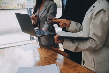 Creative team discussing about work at office, Small bussiness teamwork planing business strategy, office lifeの写真素材