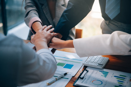 Business success. Business people handshake agreement confirmed in the investment business....