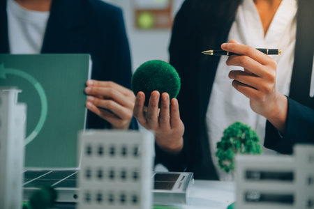 Carbon offset price report CO2 emission. Future growth Net zero waste in ESG ethical SME office protect climate change global warming social issues project. Group of asia people Eco friendly SDGs planの写真素材