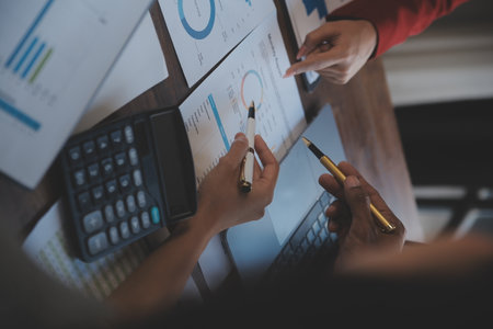 Finance manager meeting discussing company growth project success financial statistics, professional investor working start up project for strategy plan with document, laptop and digital tablet.の写真素材