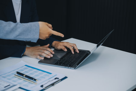 Business Documents, Auditor businesswoman checking searching document legal prepare paperwork or report for analysis TAX time,accountant Documents data contract partner deal in workplace officeの写真素材