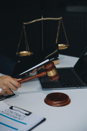 Businessman and Male lawyer or judge consult having team meeting with client, Law and Legal services concept.の写真素材