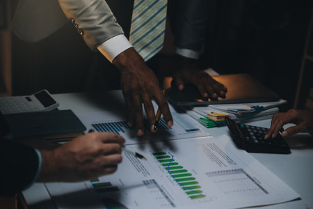 Business team meeting present, investor colleagues consultation and conference new strategy plan business and market growth on financial document graph report, Meeting and Talking.の写真素材