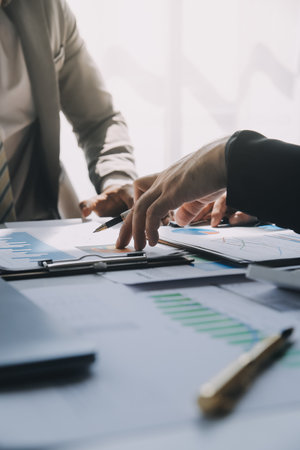 Business team meeting present, investor colleagues consultation and conference new strategy plan business and market growth on financial document graph report, Meeting and Talking.の写真素材