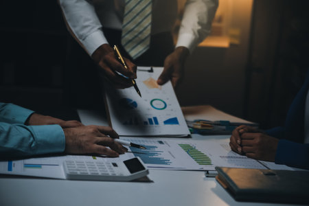 Business team meeting present, investor colleagues consultation and conference new strategy plan business and market growth on financial document graph report, Meeting and Talking.の写真素材