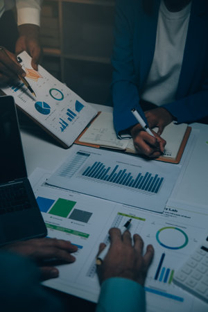 Business team meeting present, investor colleagues consultation and conference new strategy plan business and market growth on financial document graph report, Meeting and Talking.の写真素材