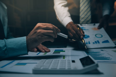 Business team meeting present, investor colleagues consultation and conference new strategy plan business and market growth on financial document graph report, Meeting and Talking.の写真素材