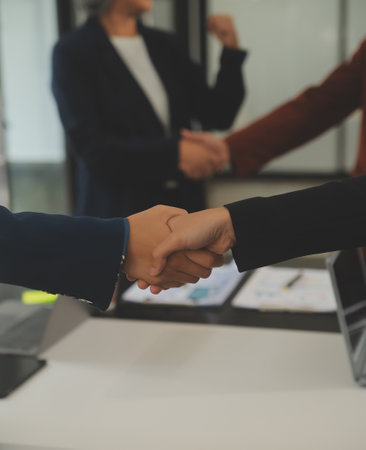 Meeting and greeting concept, Two confident Business handshake and business people after discussing...