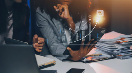 Business development to success and growing growth concept, graph with percentage sign and arrow up, represent in meanings of interest rate increase, performance, sales, percent growth.の写真素材