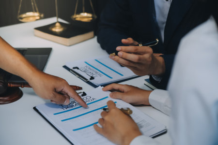 Businessman and Male lawyer or judge consult having team meeting with client, Law and Legal services concept.の写真素材