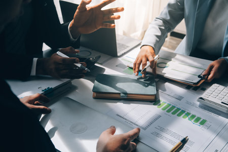 Business team meeting present, investor colleagues consultation and conference new strategy plan business and market growth on financial document graph report, Meeting and Talking.の写真素材