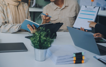 Finance manager meeting discussing company growth project success financial statistics, professional investor working start up project for strategy plan with document, laptop and digital tablet.の写真素材