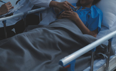 Doctor and patient discussing something while sitting at the table . Medicine and health care concept. Doctor and patientの写真素材