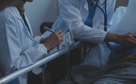 Doctor and patient discussing something while sitting at the table . Medicine and health care concept. Doctor and patientの写真素材
