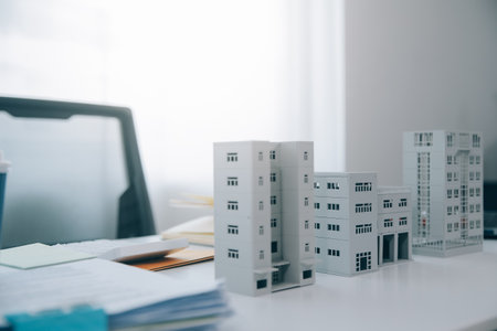 Real estate agent talked about the terms of the home purchase agreement and asked the customer to sign the documents to make the contract legally, Home sales and home insurance concept.の写真素材