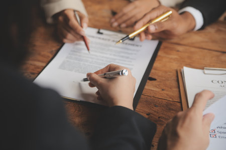 Good service cooperation, Consultation of Businesswoman and Male lawyer or judge counselor having team meeting with client, Law and Legal services concept.の写真素材