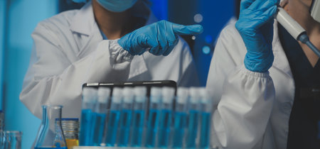 professional chemist woman laboratory using scientific microscope for science research, chemistry...