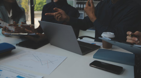 Team of business people working together in the meeting room office, teamwork background charts and graphs banner, double exposure successful teamwork,business planning concept.の写真素材