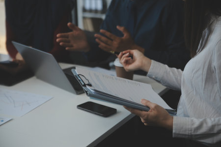 Team of business people working together in the meeting room office, teamwork background charts and graphs banner, double exposure successful teamwork,business planning concept.の写真素材