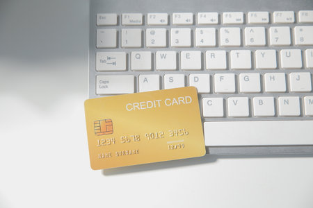 Calculator on a dark background, plastic cards and banknotes
