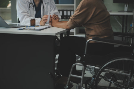 doctor holding patient's hand Cheer and encourage while checking your health. Trust your health and mind.の写真素材