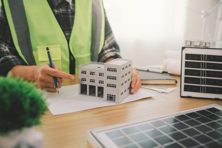 Wind energy engineer designing and developing project for residential district