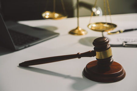 Lawyer, legal advisor, businessman brainstorming information on agreement details Business contracts in legal processing books for accuracy in contract documents. joint financial investment.の写真素材