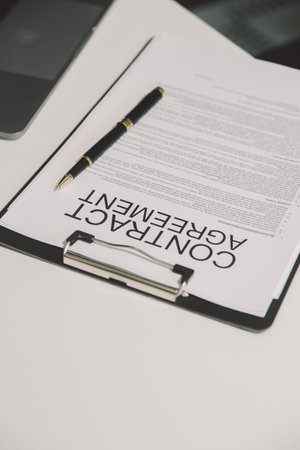 Lawyer, legal advisor, businessman brainstorming information on agreement details Business contracts in legal processing books for accuracy in contract documents. joint financial investment.の写真素材