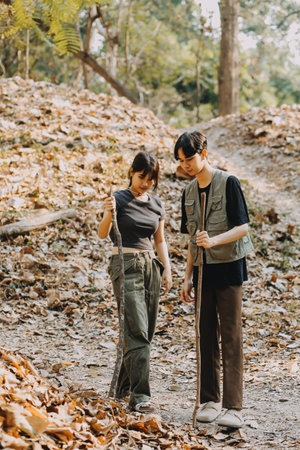 Asian couple sweet in tent inside on they camping trip, traveller relax and sleep togather in out...