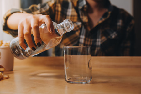 healthy beautiful young woman holding glass of waterの写真素材