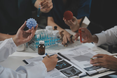 Group of professional medical doctor team meeting training medical in uniform working discussing and talk with patients record, teaching medic team, sit in hospital.health medical care conceptの写真素材